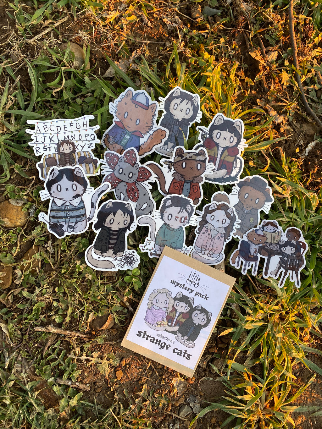 strange cats sticker mystery packs